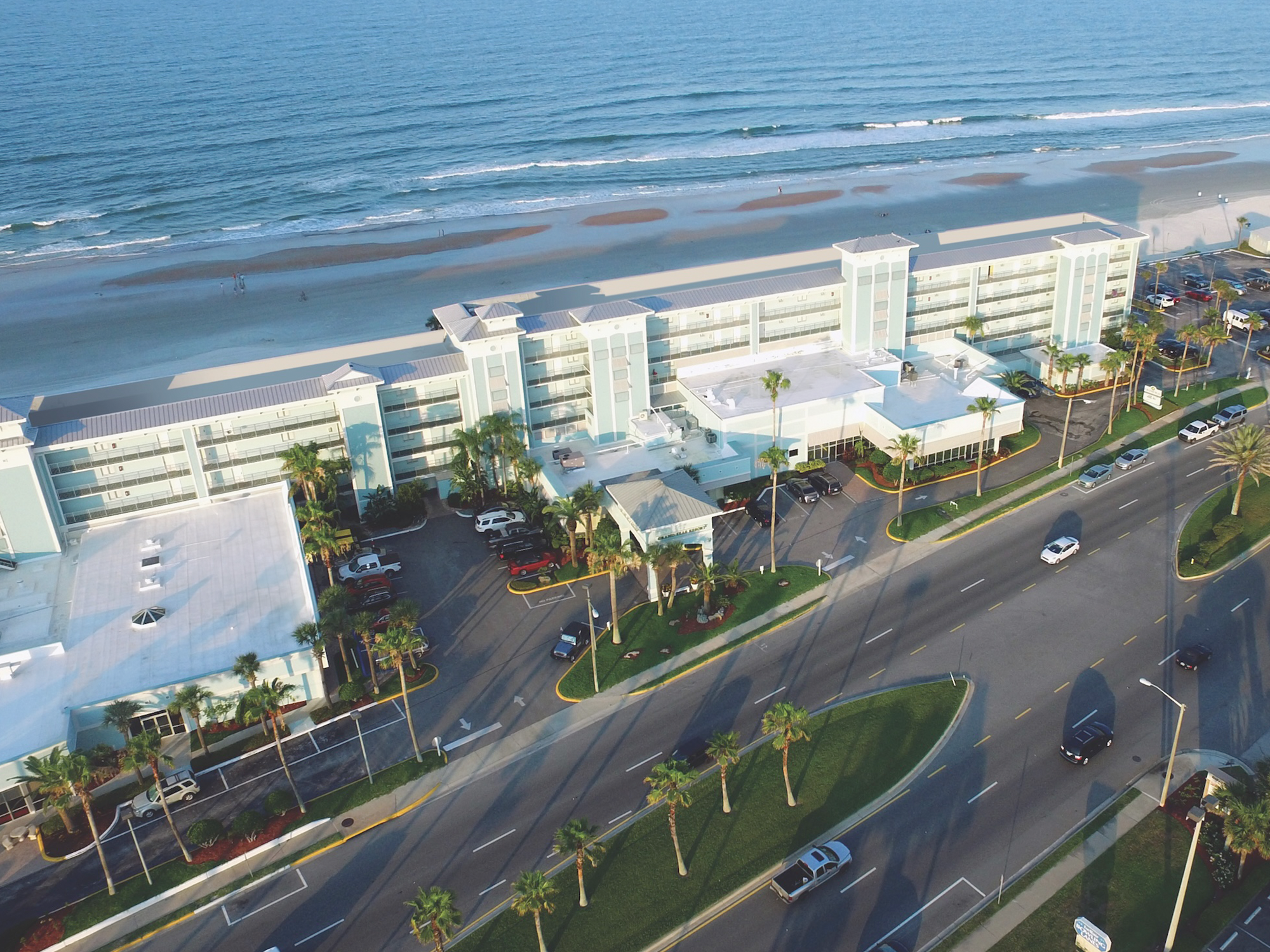 Aerial view of the grand seas daytona beach resort with ocean in the background